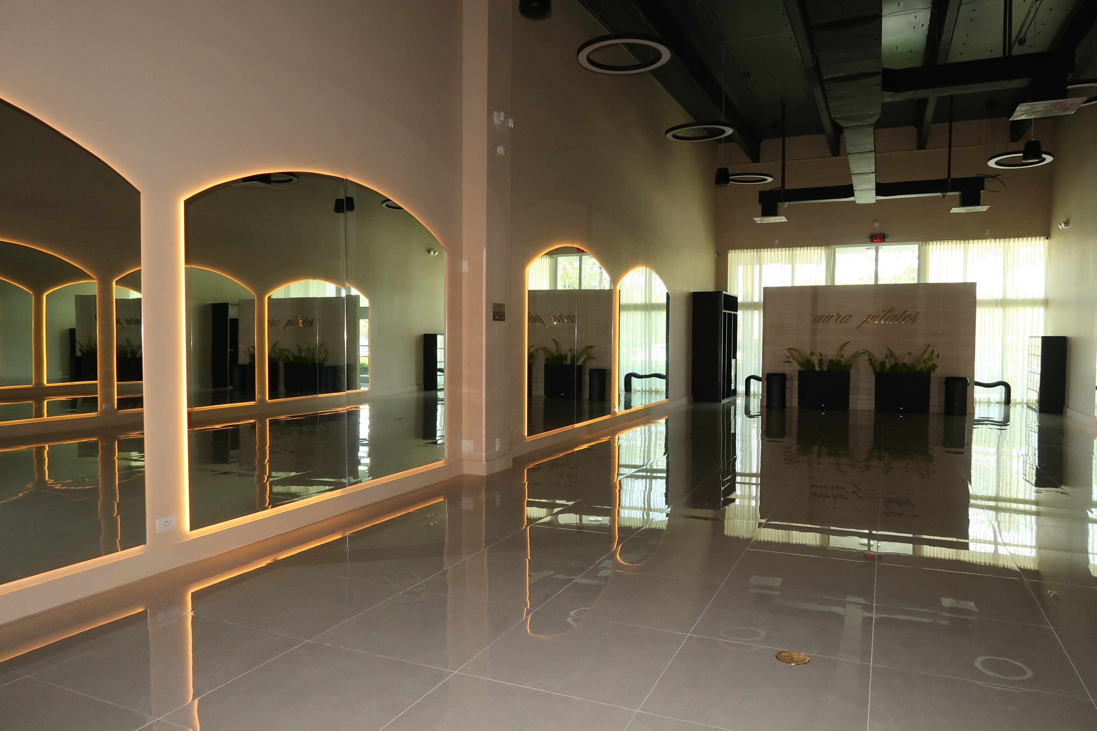 Aura Pilates reformer room interior